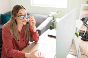 Interpreter delivering professional interpretation services over the phone as part of certified translation and global business communication provided by a professional translation agency.