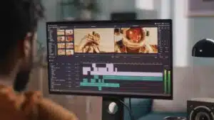 Man providing professional video translation services while working on a video project