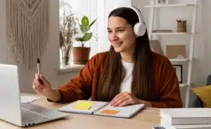 Interpreter services provided online with a professional interpreter wearing a headset and assisting clients through a virtual meeting.