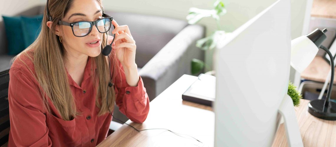 Interpreter delivering professional interpretation services over the phone as part of certified translation and global business communication provided by a professional translation agency.